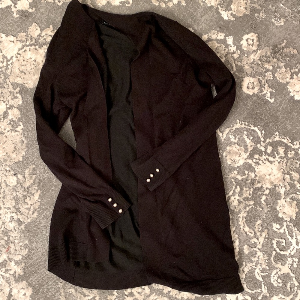 Long black sweater with pearl accent cuffs